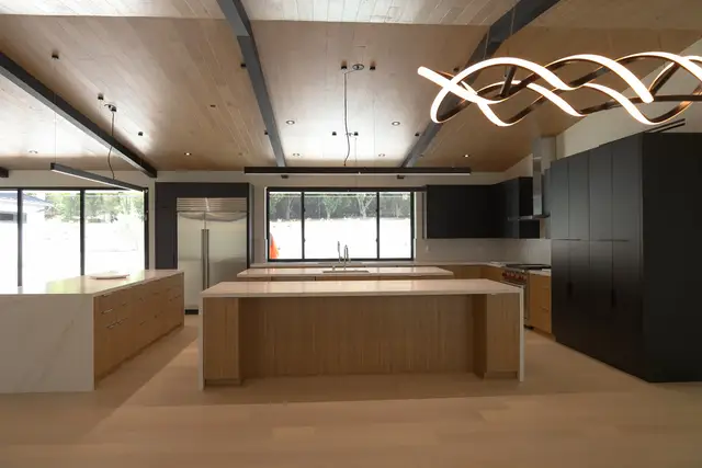 Kitchen under a wood ceiling